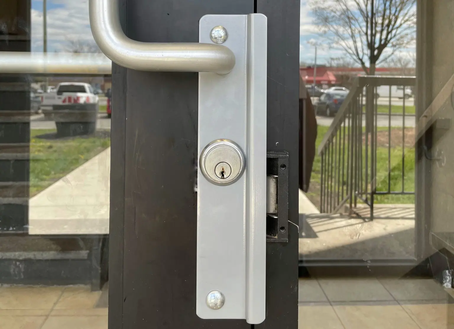 Commercial glass door with professional hardware
